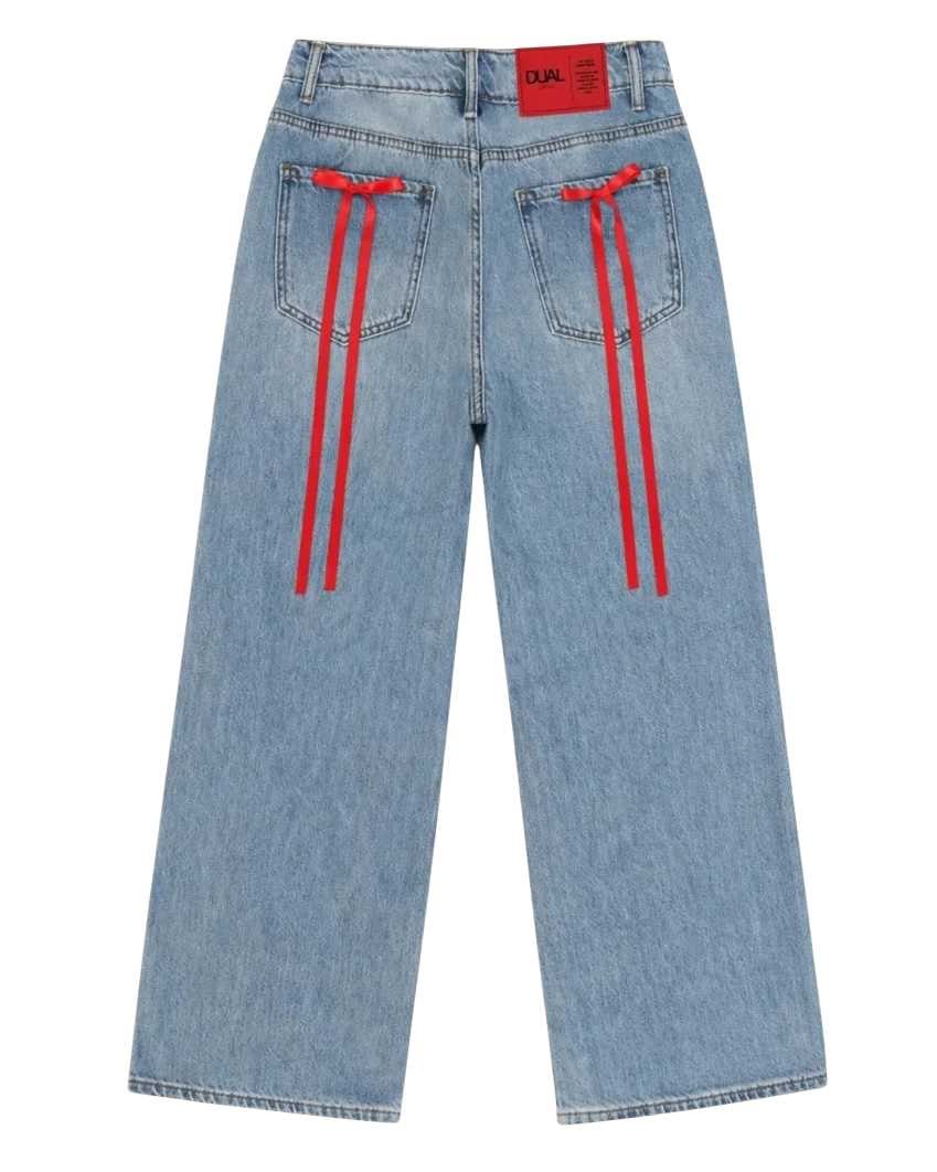 PANTALONI JEANS CON FIOCCHI ROSSI