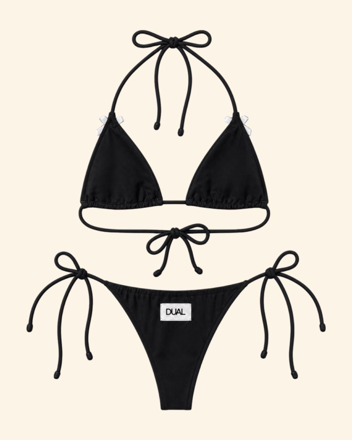 BIKINI NERO FIOCCHI BIANCHI DIETRO
