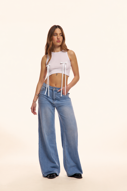 PANTALONI JEANS CON FIOCCHI BIANCHI