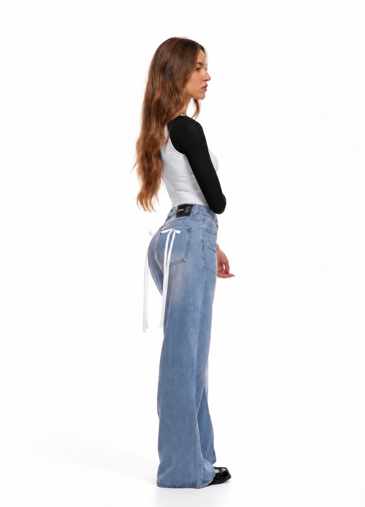 PANTALONI JEANS CON FIOCCHI BIANCHI