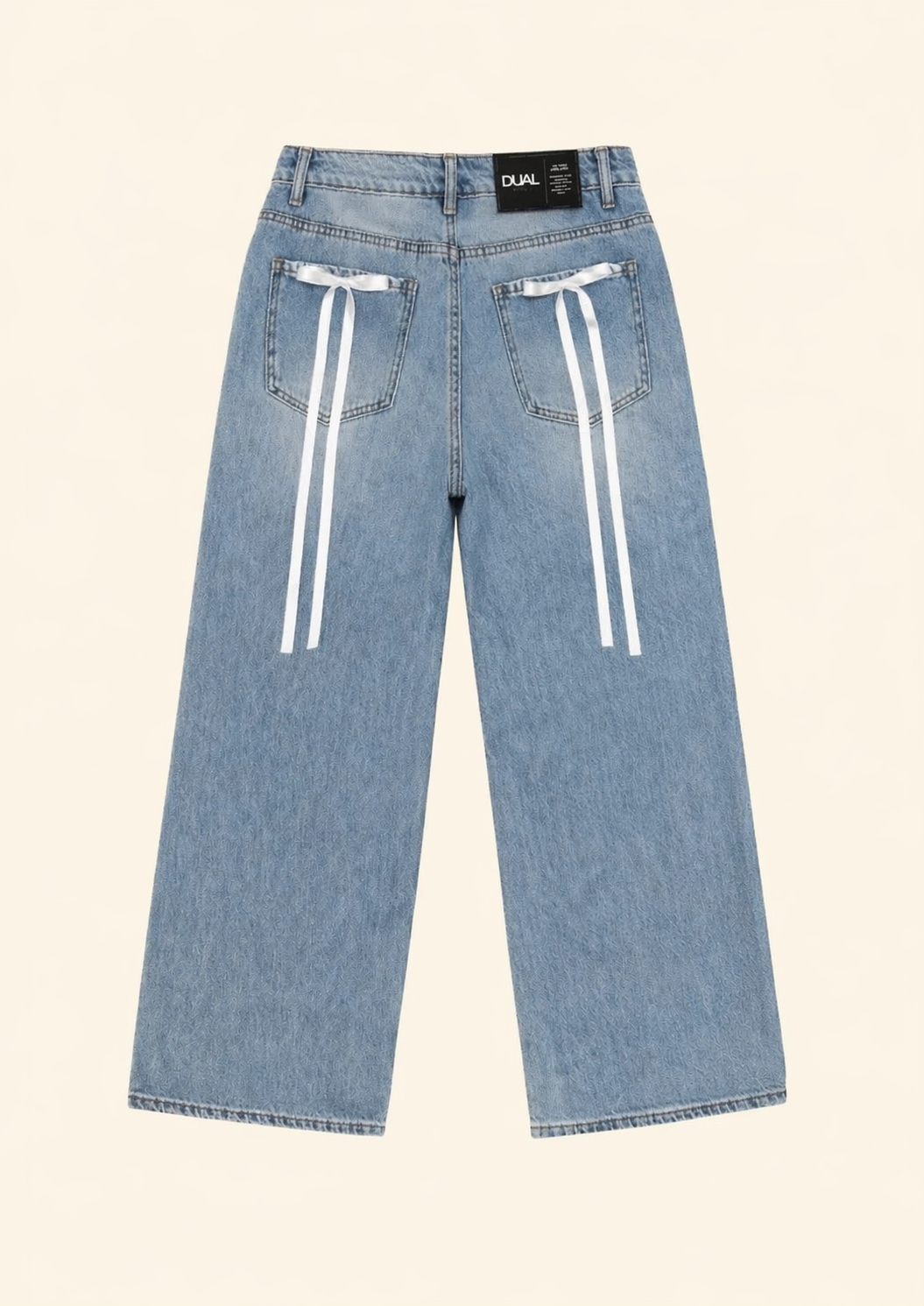 PANTALONI JEANS CON FIOCCHI BIANCHI