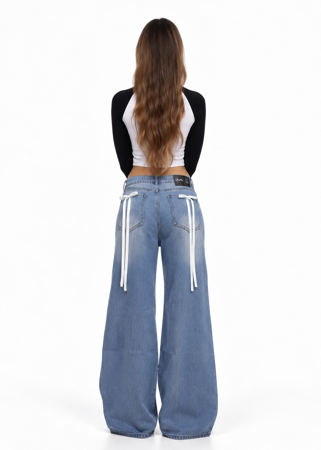 PANTALONI JEANS CON FIOCCHI BIANCHI