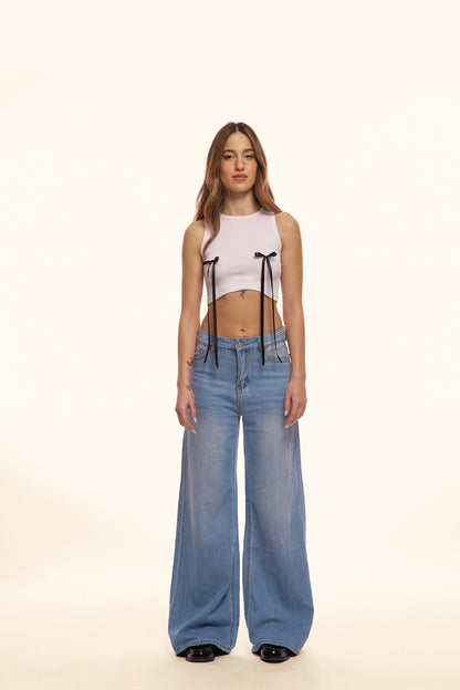 jeans con fiocchi neri