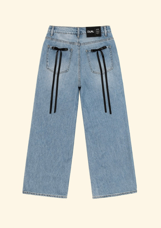 jeans con fiocchi neri