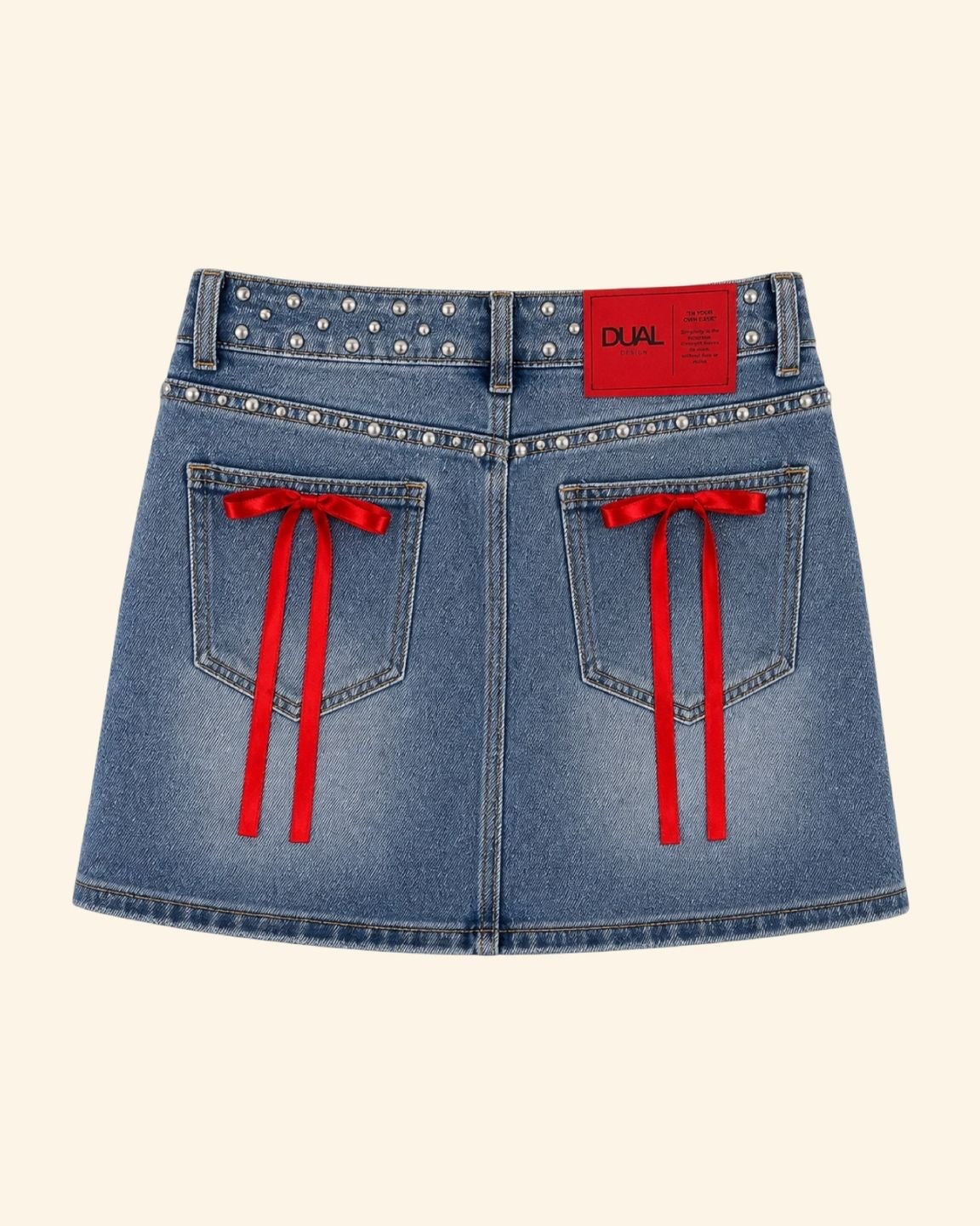 gonna denim con fiocchi rossi 