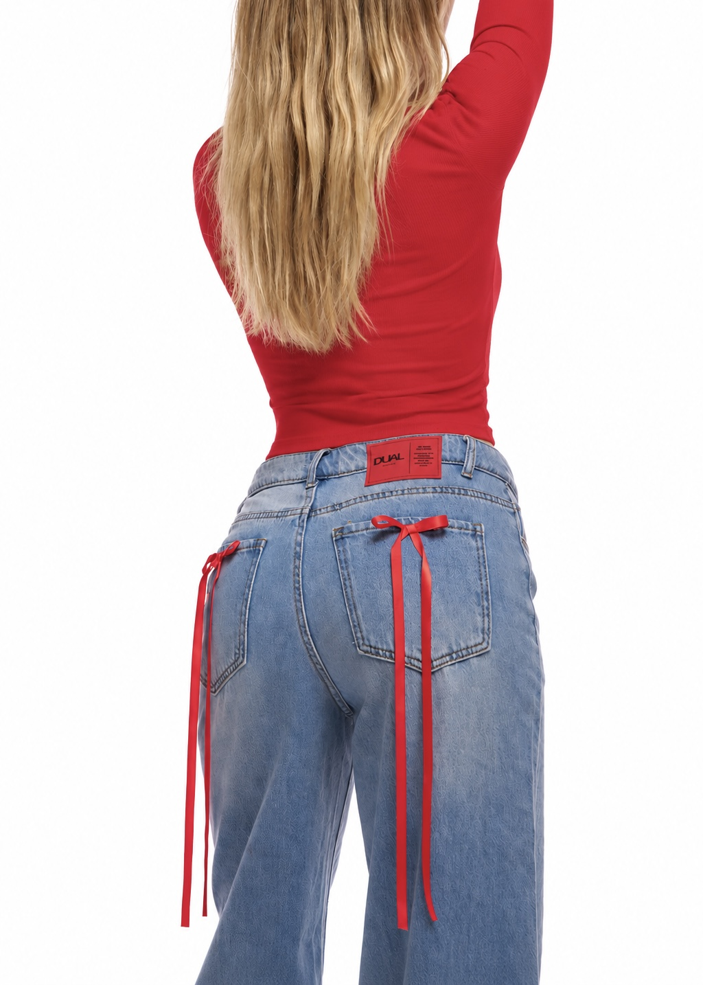 PANTALONI JEANS CON FIOCCHI ROSSI