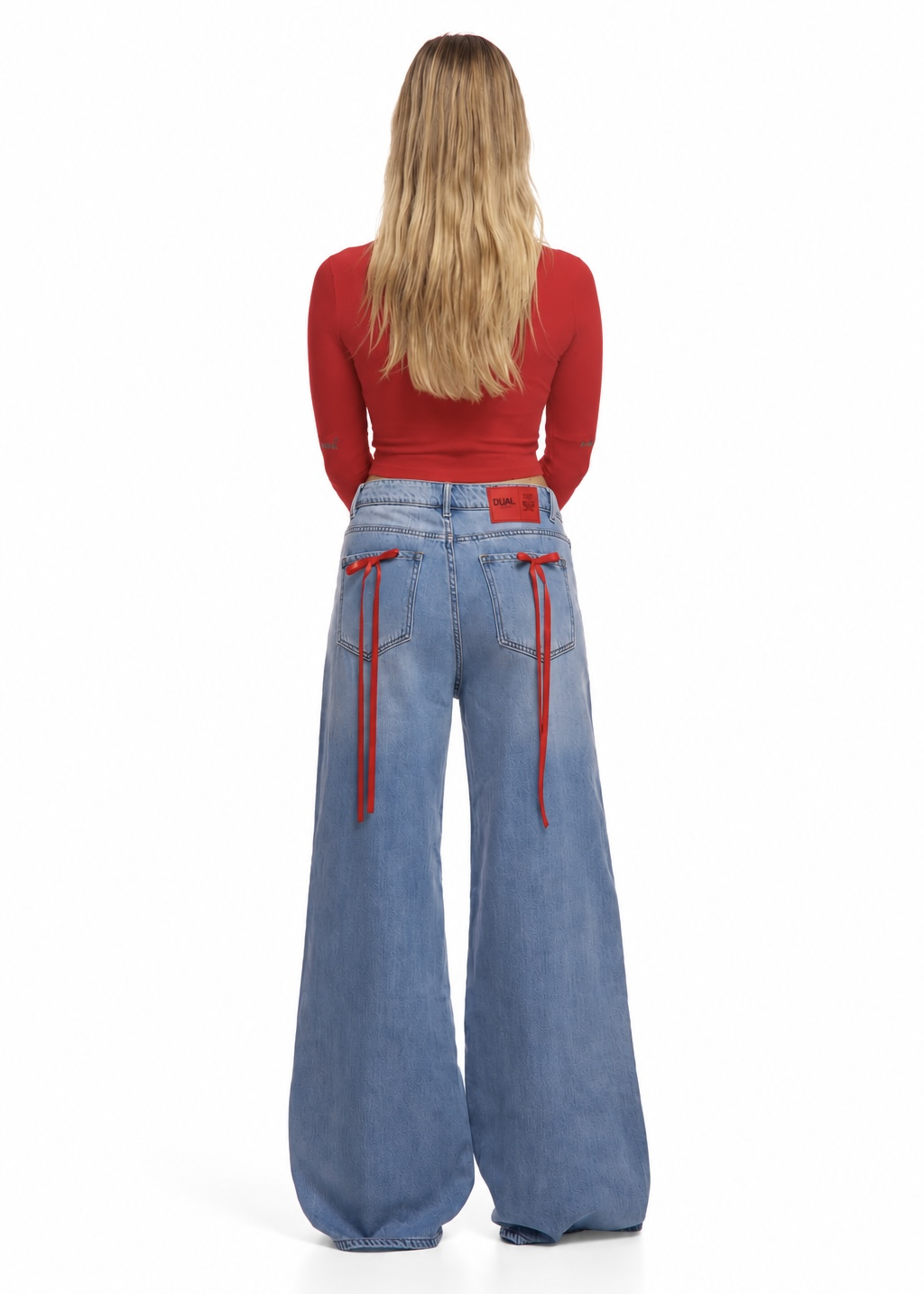 PANTALONI JEANS CON FIOCCHI ROSSI