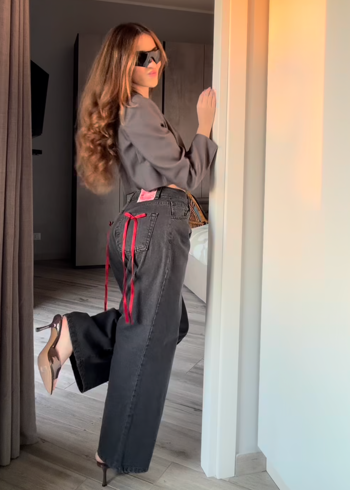 jeans nero fiocchi rossi
