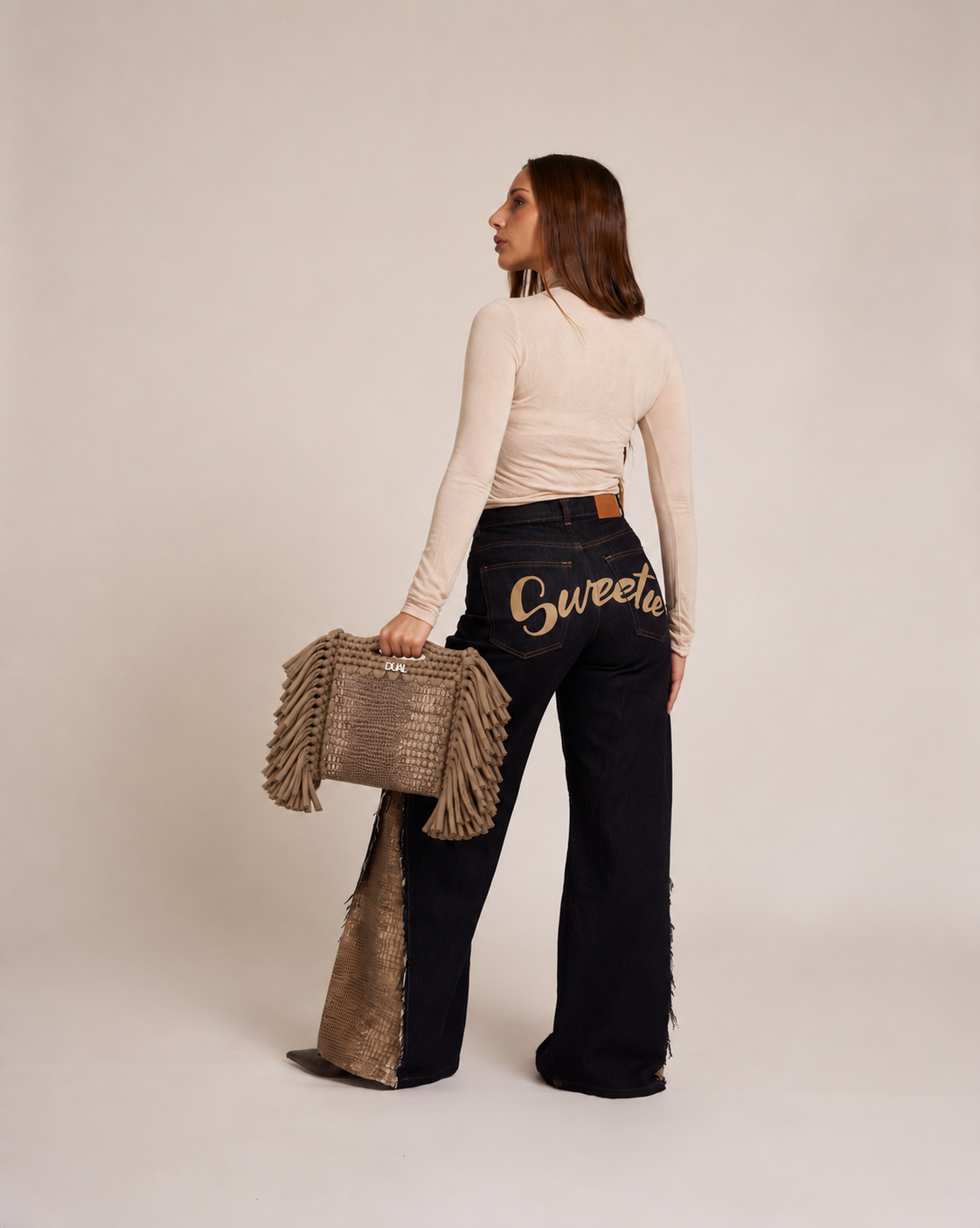 look jeans borsa pitonata animalier