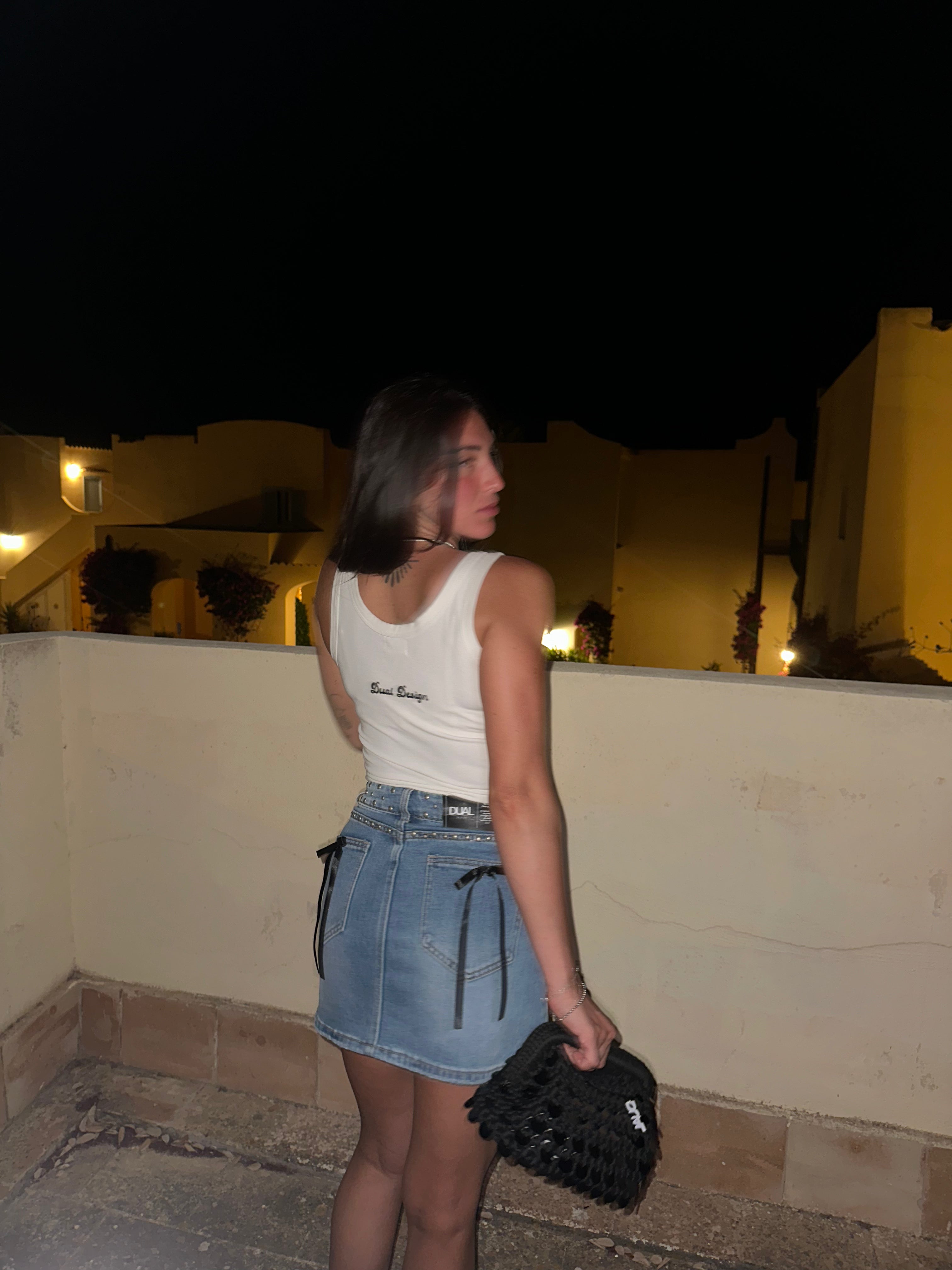 gonna denim jeans con fiocchi neri